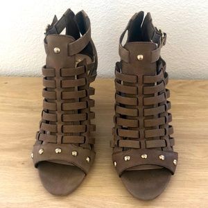 Brown leather heals, with gold studs